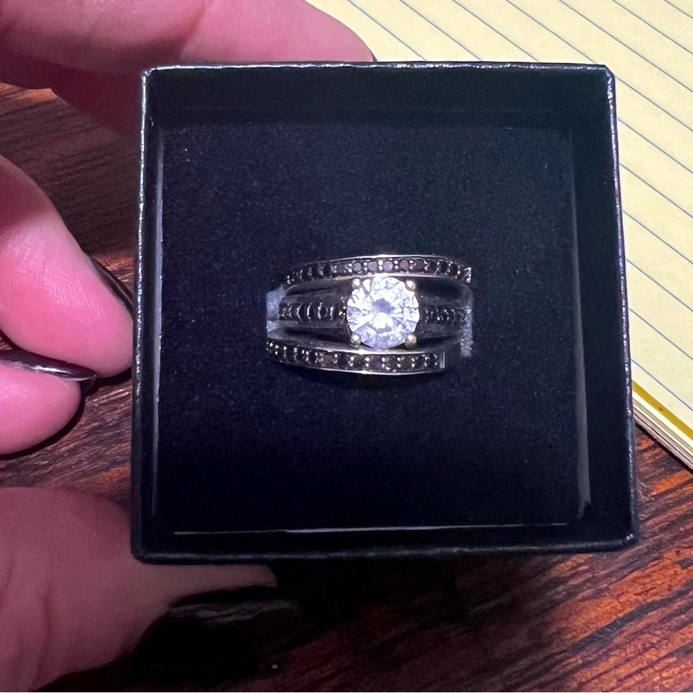 Sterling silver 1/2 CTW Black Diamond & white Sapphire.